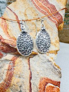 Add some bohemian flair to your jewelry collection with these stunning Silver Boho Earrings. The intricate filigree design and dangle style make these earrings a true statement piece. These Large Boho Earrings are perfect for adding a touch of bohemian charm to any outfit. Makes a great gift for her. Ornate Oval Earrings For Gift, Ornate Oval Earrings As Gift, Bohemian Teardrop Sterling Silver Plug Earrings, Bohemian Teardrop Filigree Jewelry, Bohemian Pierced Teardrop Earrings In Sterling Silver, Bohemian Sterling Silver Teardrop Earrings, Bohemian Sterling Silver Teardrop Plug Earrings, Bohemian Sterling Silver Filigree Teardrop Earrings, Bohemian Teardrop Single Plug Earring