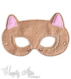 a cat mask with pink ears on it