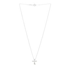 This is an authentic TIFFANY Sterling Silver Diamond Elsa Peretti Cross Pendant Necklace. The necklace is crafted of sterling silver and features a stylized cross pendant set with a single round brilliant cut diamond at its center, approximately .02 total carat weight. Tiffany Necklace, Tiffany Jewelry, Elsa Peretti, Cross Pendant Necklace, Round Brilliant Cut Diamond, Pendant Set, Silver Diamonds, Brilliant Cut Diamond, Cross Pendant