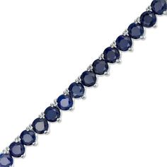 Your look isn’t complete without this eye-catching tennis bracelet. Crafted in sterling silver, this vibrant design sparkles with a row of 4.0mm lab-created bright blue sapphires. Buffed to a brilliant luster, this 7.25-inch bracelet secures with a tongue and groove clasp. Sapphire Brilliant Cut Tennis Bracelet, Classic Sapphire Gemstone Tennis Bracelet, Classic Sapphire Tennis Bracelet With Round Shape, Sapphire Tennis Bracelet Fine Jewelry With Prong Setting, Classic Sapphire Tennis Bracelet With Prong Setting, Sapphire Cubic Zirconia Tennis Bracelet With Gemstone, Sapphire Sterling Silver Jubilee Tennis Bracelet, Blue Round Tennis Bracelet With Prong Setting, Blue Tennis Bracelet With Prong Setting