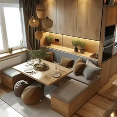 a living room filled with lots of furniture and wooden flooring next to a window