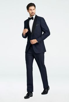 Sure to be a mainstay in your wardrobe for years to come, this sartorial staple is one smart investment. In a dark shade of blue that almost appears black, the Hampton Midnight Tuxedo is made from luxurious cashmere and Super 140s wool, and beautifully structured for a clean drape and sleek silhouette. Satin trim provides stylish contrast, subtly highlighting the buttons, lapels, and pockets. Dark Navy Tuxedo, Blue Prom Tuxedo Ideas, Modern Evening Suits With Suit Collar, Modern Evening Suit With Notch Lapel, Formal Tuxedo With Suit Collar For Galas, Classic Semi-formal Tuxedo For Gala, Formal Notch Lapel Suit For Gala, Formal Blue Tuxedo With Pressed Crease, Notch Lapel Suits For Gala