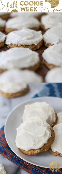 cookies with white frosting are on a plate and in the background there is a blue cloth