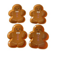 four gingerbread cookies with bow ties on them