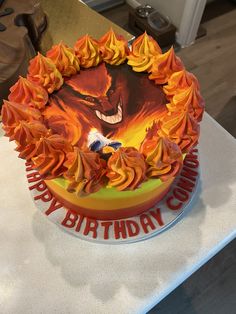 a birthday cake with an image of a bear on it