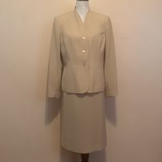 Jacket And Skirt Are: Size 12 100% Polyester Putter And Lining Jacket Is 3 Button Closure Padded Shoulders Sleeve: 24” Faux Button Cuff No Collar Armpit To Armpit: 24” Down Back Seam: 24” Skirt: A Line Zipper And Hook And Eye Rear Closure Waist: 32” Rear Kick Pleat Down Back Seam: 26” Hips: Approximately 21” Spot On Left Cuff Area These Items Are Not Brand New. Some Resizing And Normal Wear May Be Visible To You Spring Workwear Skirt Suit With Buttons, Classic Tailored Long Sleeve Skirt Suit, Spring Skirt Suit For Workwear, Spring Skirt Suit With Buttons And Long Sleeves, Tailored Long Sleeve Solid Skirt Suit, Tailored Skirt Suit With Notch Lapel, Tailored Skirt Suit With Notch Lapel And Buttons, Spring Fitted Skirt Suit With Button Closure, Classic Long Sleeve Skirt Suit For Career