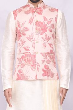 Pink bundi with floral and leaf printed motifs, textured detail and patch pocket. Paired with pleated asymmetric kurta and churidar.
Component: 3
Printed
Neckline: Band
Sleeve Length: Full
Fabric: Art Silk
Color: Pink,White
Front button placket
Welt pockets - Aza Fashions Asymmetric Kurta, Kurta Set For Men, Nehru Jackets, Fashion App, Churidar, Kurta Set, Modern Bride, Fabric Art, White Art