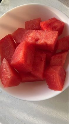 slices of watermelon in a white bowl