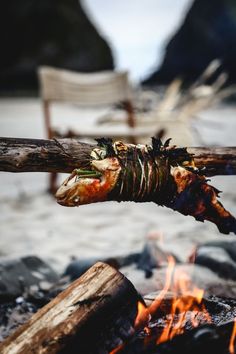 a piece of wood sitting on top of a fire