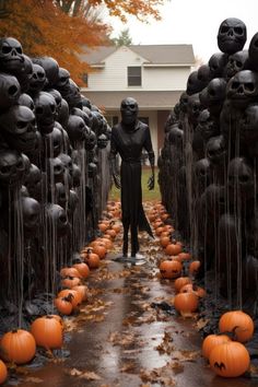 a halloween scene with pumpkins and skulls on the ground