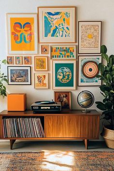 a room with various pictures and records on the wall