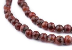 the beads are red and brown in color