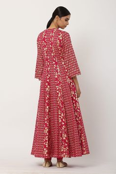 Pink Angarkha kurta in cotton mul base fabric with side tie-up, contrast gold motifs, sequins embroidered sleeves and beaded hem. Paired with a churidar and cutwork hem dupatta.
Component: 3
Pattern: Printed
Neckline: V-Neck
Sleeve Type: Straight
Fabric: Cotton Mul, Lining: Cotton Mul
Color: Pink
Other Details: 
Side tie-up
Multi motifs
Sequins embroidered and tie-up
Triangular cutwork hem dupatta
Occasion: Puja - Aza Fashions Chanderi Long Sleeve Anarkali Set With Block Print, Long Sleeve Chanderi Anarkali Set With Block Print, Cotton Anarkali Set With Pallu And Long Sleeves, Cotton Long Sleeve Anarkali Set With Pallu, Traditional Long Sleeve Chanderi Wear With Block Print, Designer Wear Long Sleeve Block Print Anarkali Set, Long Sleeve Chanderi Block Print Traditional Wear, Designer Long Sleeve Block Print Anarkali Set, Transitional Cotton Anarkali Set With Long Sleeves