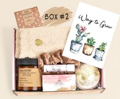 an open box containing various items including soaps, scrubs and lotions with thank you for helping me grow written on the front