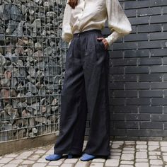 "These Linen Palazzo Pants for Women are designed for both elegance and practicality, making them an ideal choice for your wardrobe. The business casual appeal of these Linen Pants ensures versatility, allowing you to seamlessly transition from work to leisure. Crafted with attention to detail, these pants offer a flattering high-waisted fit, pleated design, and convenient pockets. DETAILS ⚬ Pleated front. ⚬ Adjustable elastic waistband in the back. ⚬ Zipper and button closure. ⚬ Side and back p Classic Full-length Linen Wide Leg Pants, Linen Wide Leg Bottoms With Pull-on Style, Elegant Full-length Linen Wide Leg Pants, Chic Linen Wide Leg Pants With Pull-on Style, Pull-on Linen Wide-leg Pants, Linen Palazzo Pants, Pants Elegant, Pockets Details, Womens Trousers