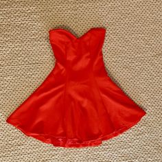 Material Is Thick And Stretchy, Almost Like Neoprene. Never Worn, But Altered To Fit Like A S, Stitches In Back Can Be Taken Out To Fit M. Rubber Around Bust Area Keeps Dress In Place. Red A-line Mini Dress With Lining, Red A-line Mini Dress Lined, Flirty Red Lined Mini Dress, Red Mini Dress With Sweetheart Neckline, Red Lined Dress For Holidays, Holiday Fitted Strapless Dress, Holiday Strapless Fitted Dress, Strapless Fitted Holiday Dress, Yellow Flower Dress