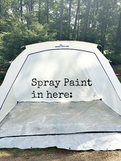 a tent with the words spray paint in here