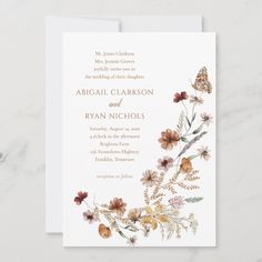 a wedding card with flowers and butterflies on it