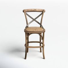 a wooden chair with a cross back and wicker seat, on a white background