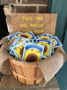 a basket filled with lots of cards sitting on top of a wooden crate