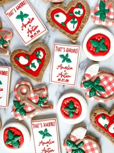 cookies decorated with red and green decorations on a table