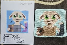 a crochet pattern next to a piece of paper with an image of yoda from star wars on it