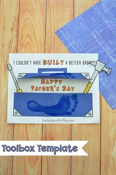 an image of a father's day card with paper and scissors on the table