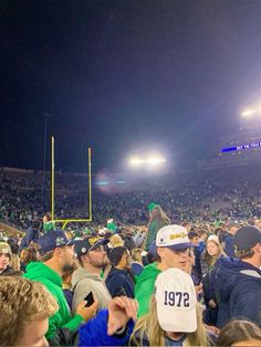 a crowd of people at a football game