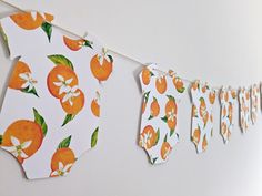 an orange themed banner hanging on a wall