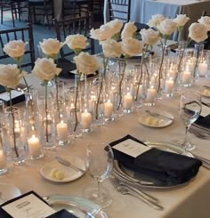 Wedding Table Set Up With Candles, Weddings Ideas Elegant, White Roses Bridal Shower Decor, White Roses Long Table, White Wedding Table Decor With Candles, White Rose Candle Centerpiece Wedding, Antique Silver Wedding Decor, Wedding Cake Table Floral Arrangements, Classy Wedding Centerpieces Diy