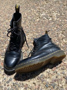 Size 7//Black 1460 Dr Martens AirWair Leather Boots Classic style. Unisex. 8 eyelet lace up boots. Preloved, some scuffs on the toes are the biggest signs of wear. Air cushion soles appear barely worn. punk rock work utility classic goth grunge whimsygoth combat work boots Round Toe Combat Boots With Lacing For Streetwear, Alternative Leather High-top Lace-up Boots, Alternative Style Leather Lace-up Boots With Round Toe, Alternative Style Lace-up Leather Boots, Leather Footbed Work Boots With Round Toe For Streetwear, Ankle-high Steel Toe Lace-up Boots For Streetwear, Alternative Style Leather Combat Boots With Round Toe, Grunge Leather Martin Boots With Round Toe, Streetwear Lace-up Boots With Leather Footbed