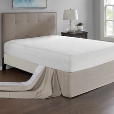 the bed is made and ready for someone to use it in their home or office