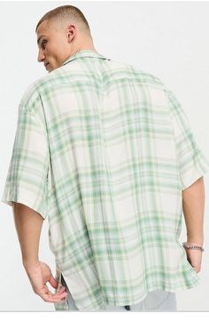 Adult Men's Measurements - THIS ITEM IS OVERSIZED (normal large would be 24 inches from armpit to armpit) 26 inches from armpit to armpit 24 inches from shoulder to shoulder 31 inches from neckline to waistline Classic plaid details this breezy button-up shirt crafted from silky, lightweight viscose for a perfectly relaxed feel. Notched collar Short sleeves 100% viscose Machine wash, line dry Asos Men, Design Camp, Mens Measurements, Stop Scrolling, Revere Collar, Check Design, Cheque Design, Notched Collar, Green Plaid