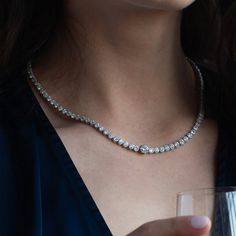 Our Celeste Tennis Necklace is epitome of classy and iconic. Dazlling enough on its own, but looks even more glamorous if you add on the matching Celeste Tennis Bracelet and earrings for a red-carpet ready look. This necklace guarantees an unforgetttable impression. - Rhodium Plating over Brass- Cubic Zirconia- Length approximately 16.5"- Available in White Gold only Tennis Necklace Outfit, Necklace Outfit, Red Carpet Ready, Cultured Pearl Necklace, Gold Statement Necklace, Bow Jewelry, Birthstone Pendant, Tennis Necklace, Statement Bracelet