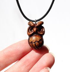 The owl pendant is carved from natural walnut wood. This is a truly unique work made by hand. The decoration is tinted and covered with a protective layer of glossy varnish. The length of the pendant is adjustable Carved Brown Jewelry For Gifts, Brown Carved Jewelry Gift, Rustic Carved Jewelry As Gift, 5 Year Anniversary Gift, Wooden Owl, 5 Year Anniversary, Anniversary Gift For Him, Necklace For Her, Owl Necklace