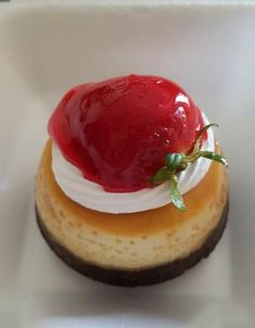 a small dessert with a strawberry on top