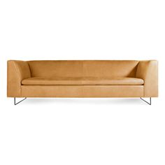 a tan leather couch with metal legs on an isolated white background, viewed from the front