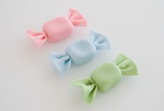 three different colored bows on top of each other