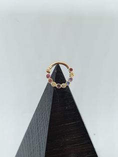 Rainbow Septum Clicker Natural Stones - 1.5mm Inner Diameter; 6mm,7mm,8mm, 10mm Septum ring: 18g, 16g , 14g. Materials :14K solid gold yellow god,rose gold,white gold Option stone: Emerald, Sapphires , Ruby, Black Diamonds Returns and exchange details. If you want to change or exchange the product you purchased, you need to send it back to me and write me the tracking number within 7 days from the date of receipt. After I get it back we will discuss the details of the change . Re-delivery will c 14k Gold Septum Ring With Halo Detail As Gift, 14k Gold Halo Septum Ring As A Gift, Rainbow Septum, Gold Septum, Daith Earring, Daith Rings, Conch Hoop, Daith Earrings, Septum Clicker