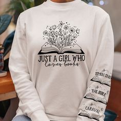 For the bookworm who always has their nose in a novel, our personalized book lover sweatshirt is the perfect gift. The soft, lightweight fabric will keep them cozy whether curled up reading or out exploring new bookstores. This bookish tee makes a thoughtful gift for voracious readers, book club members, librarians, authors and bookstore employees. Give it to your friend who flies through a new novel each week or the coworker who is always recommending books. It's ideal for birthdays, holidays o Bookish Long Sleeve Sweatshirt Gift, Bookish Long Sleeve Sweatshirt As Gift, Literary Long Sleeve Tops With Letter Print, White Bookish Sweatshirt With Letter Print, Book Nerd Shirts, Sweater Tshirt, Mom Daughter Gifts, Canvas Beach Bag, Leather Flask