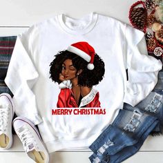 Black Woman Christmas Sweatshirts   White soft sweater, printed with this stunning design saying Merry Christmas or Santa Baby. Self fabric collar.  Taped neck.  Twin needle stitching. All items will be shipped via Royal Mail Also available as a mug, PJs and matching girl version www.etsy.com/uk/shop/ElegantTreatsuk?ref=seller-platform-mcnav&section_id=34383794&page=1#items Winter Graphic Print Sweater For Gift, Winter Graphic Print Sweater Gift, Winter Graphic Print Sweater As Gift, Graphic Print Sweater For Winter Gift, Graphic Print Sweatshirt For Winter Gift, Graphic Print Sweatshirt As Winter Gift, Graphic Print Sweatshirt Winter Gift, Christmas Graphic Print Holiday Sweatshirt, Holiday Sweatshirt With Graphic Print