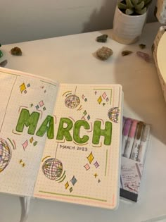 a notebook with the word march written on it