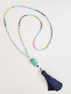 Baby blue tassel necklace - handmade tassel - extra long beaded - white buddha - seed bead necklace Tiny Bead Necklace Dainty Necklace Tiny Women extra long necklace. 24 inches TAKE ADVANTAGE OF COMBINED SHIPPING Only 0.50€ (about 0.60 USD) for adicional item!! Handmade with love :) Bohemian Blue Beaded Necklaces With Tiny Beads, Blue Long Beaded Necklace With Tiny Beads, Blue Beaded Tassel Necklace For Festival, Blue Multi-strand Necklace With Tiny Beads, Handmade Adjustable Blue Tassel Necklace, Tiny Woman, Extra Long Necklace, Blue Tassel, Seed Bead Necklace