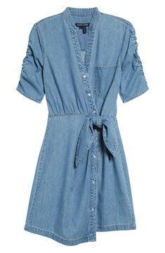 Ruched sleeves and a front tie detail put a contemporary spin on a nonstretch denim shirtdress in a mini length. 33 1/2" length Front snap closure Band collar Elbow-length sleeves Attached waist tie 100% cotton Dry clean Imported Summer Workwear Medium Wash Shirt Dress, Spring Short Sleeve Shirt Dress With Tie Fastening, Casual Button-up Shirt Dress With Tie Fastening, Short Sleeve Shirt Dress With Tie Fastening For Spring, Casual Collared Shirt Dress With Tie Fastening, Casual Shirt Dress With Tie Fastening For Spring, Casual Shirt Dress With Tie Fastening For Day Out, Casual Mini Shirt Dress With Tie Waist, Casual Workwear Mini Dress With Tie Waist