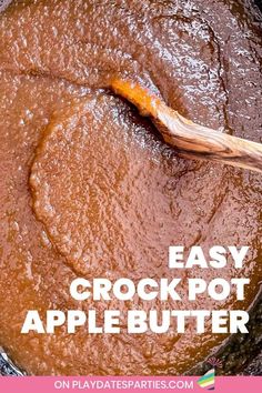 an easy crock pot apple butter recipe in a skillet with a wooden spoon