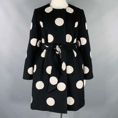 Kate Spade Coat In A Black And White Wool Blend Fabric Featuring A Collarless Style, Giant Polka Dot Pattern, And A Zip & Snap Closure With Belt. Made In Poland.Excellent Pre-Owned Condition. Marked: L Measurements: Shoulder: 17 Inches Bust: 42 Inches Sleeve: 24.5 Inches Length: 37.5 Inches Sui Generis Reference: 131218 Category: Coat More Details Brand: Kate Spade Gender: Female Size: L Color: Black Color 2: White Fabric: Wool Blend Pattern: Polka Dot Style: Collarless Age Group: Adult Sui Gene Elegant Kate Spade Outerwear For Work, Polka Dot Long Sleeve Winter Outerwear, Elegant Kate Spade Spring Outerwear, Chic Kate Spade Winter Outerwear, Chic Winter Outerwear By Kate Spade, Chic Long Sleeve Kate Spade Outerwear, Kate Spade Fitted Spring Outerwear, Fitted Kate Spade Outerwear For Spring, Fitted Kate Spade Spring Outerwear