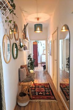 the hallway is clean and ready for us to use as an entrance way in this home