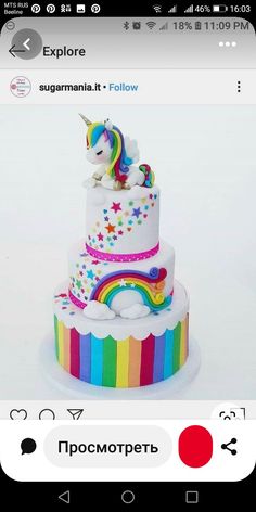 a rainbow cake with a unicorn on top is shown in the instagramr box