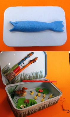 two pictures of fish shaped objects in a tin with water and grass inside, on an orange background