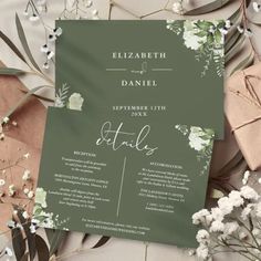 wedding stationery with greene and white flowers